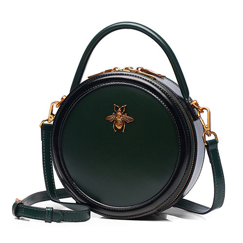 Green python shoulder bag with black trim and shoulder strap — DLS